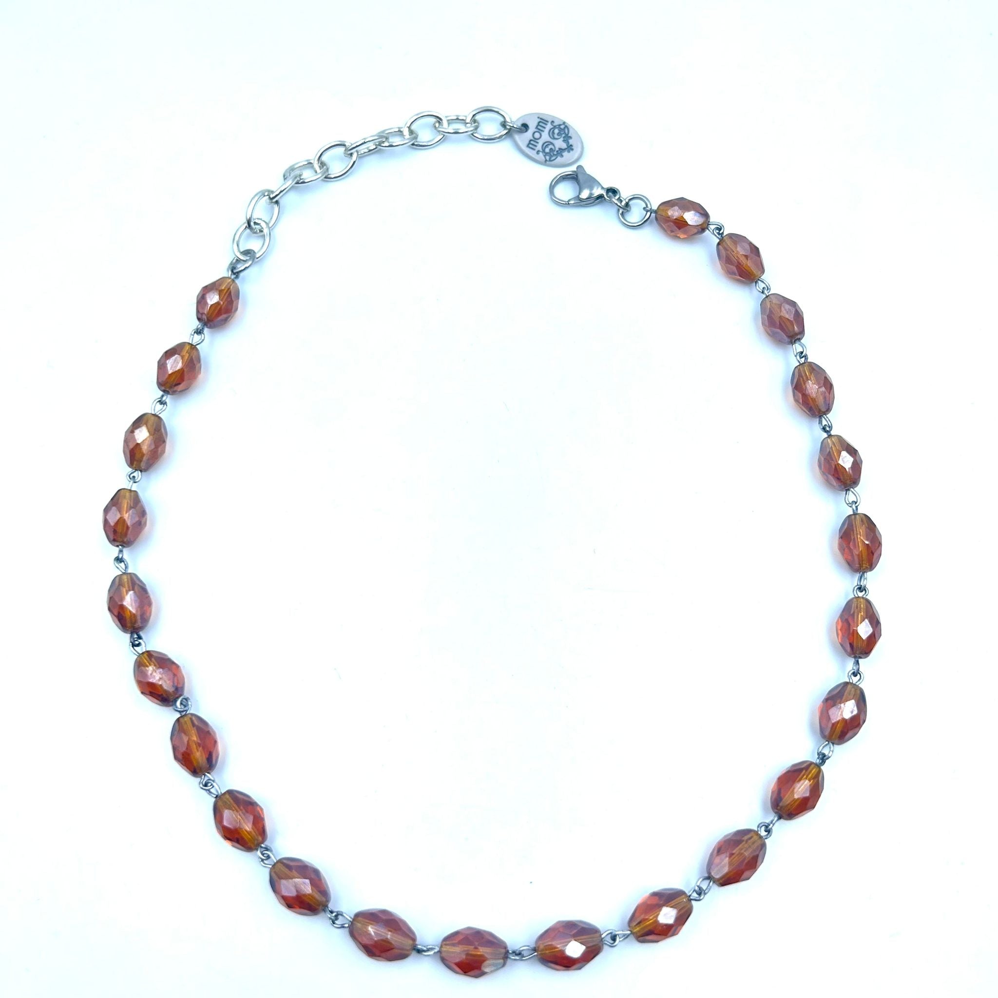 Collana con cristalli oliva incatenati